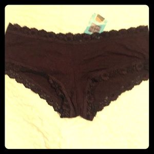 Soft stretch knit, organic cotton with lace trim.